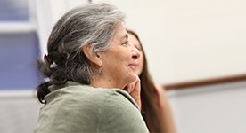 Patients and families talking at table